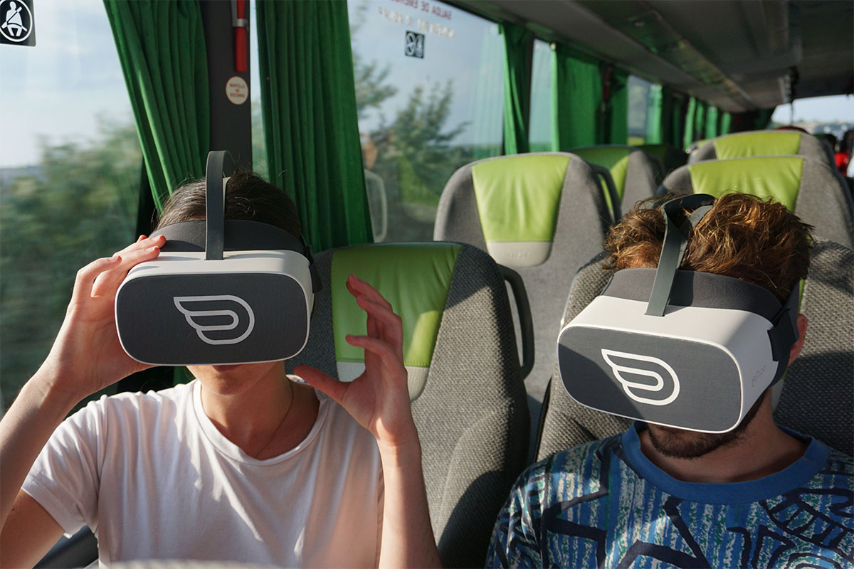 Two mens having VR experience on a flixbus