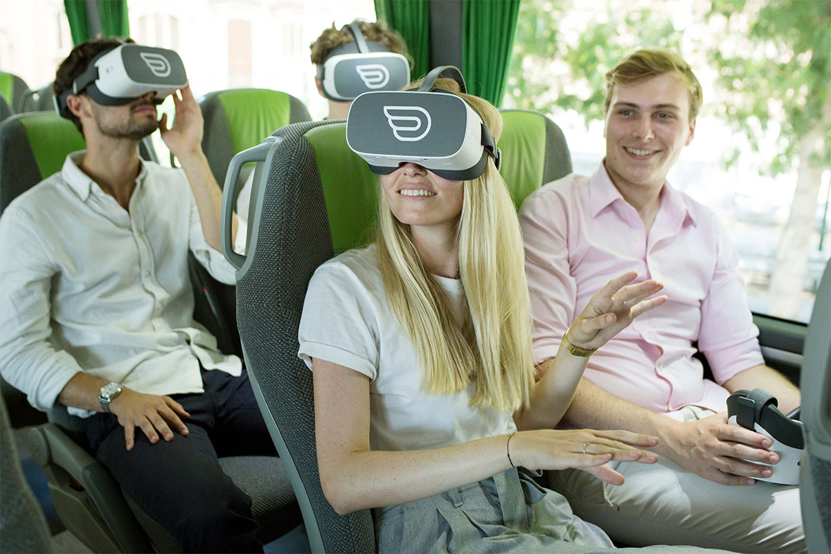 group of people enjoying inflight VR experience on Flixbus